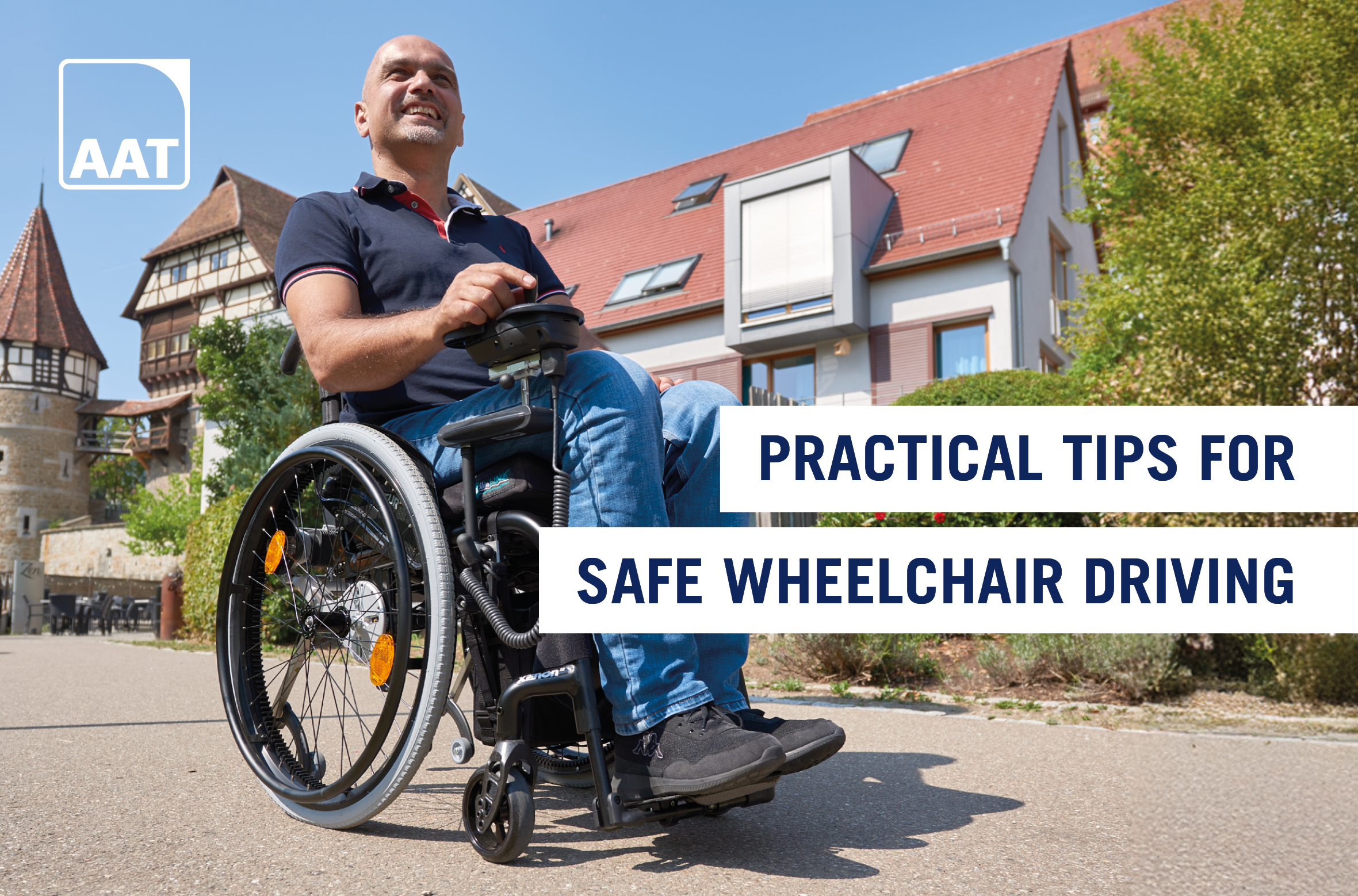 The picture shows a middle-aged man driving through the city in a manual wheelchair with MAX-E add-on drive in good weather.